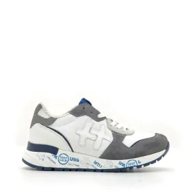 SNEAKERS IN CAMOSCIO